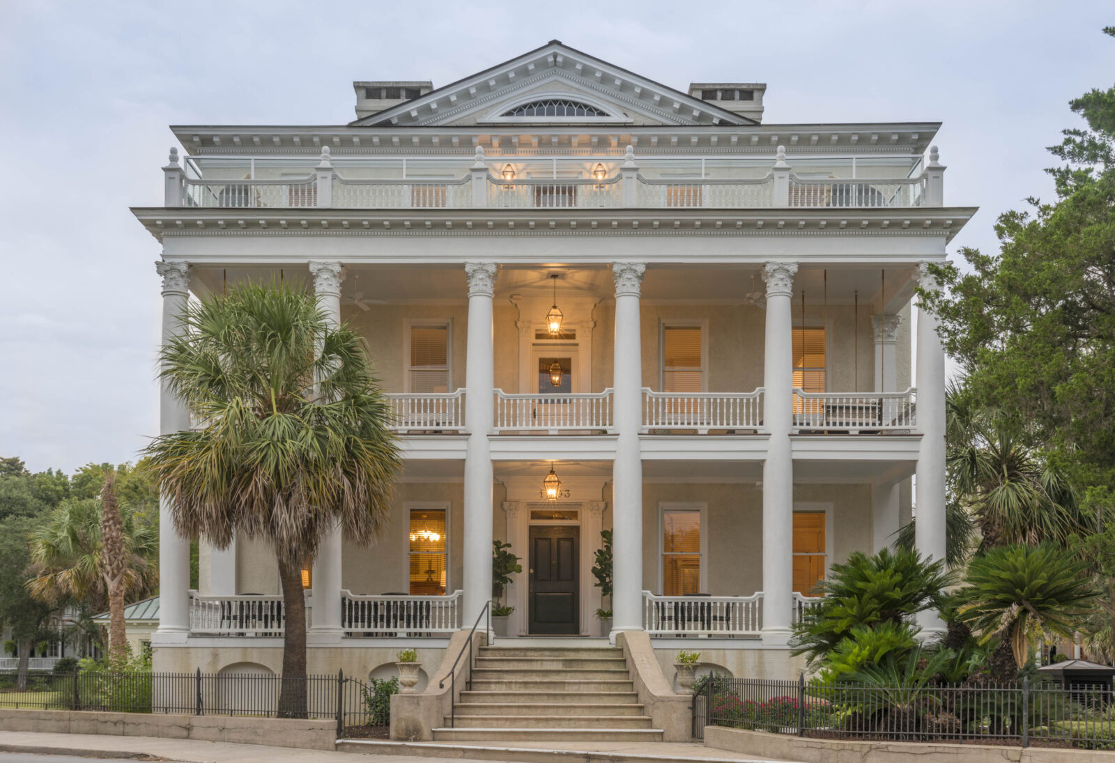 Outside a white mansion hotel