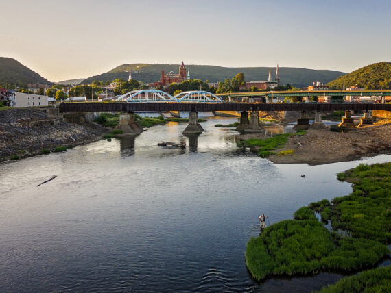 A downtown with a river and bridge