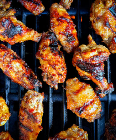 A grill filled with wings