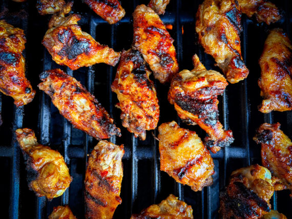 A grill filled with wings