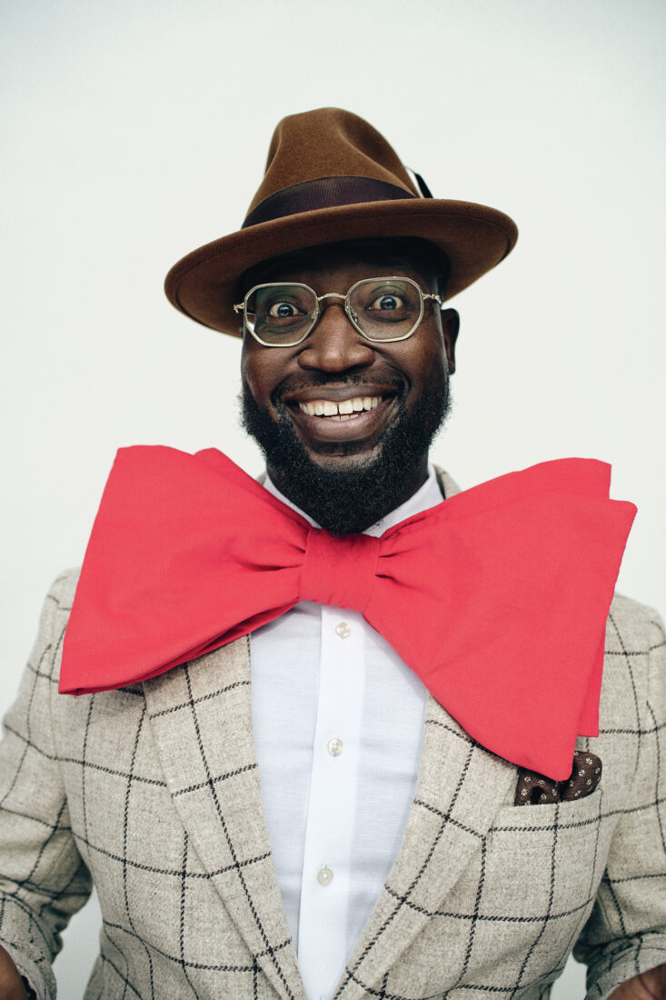 A portrait of a man with a giant bowtie