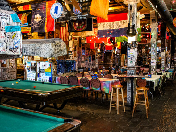 Inside a juke joint with pool tables