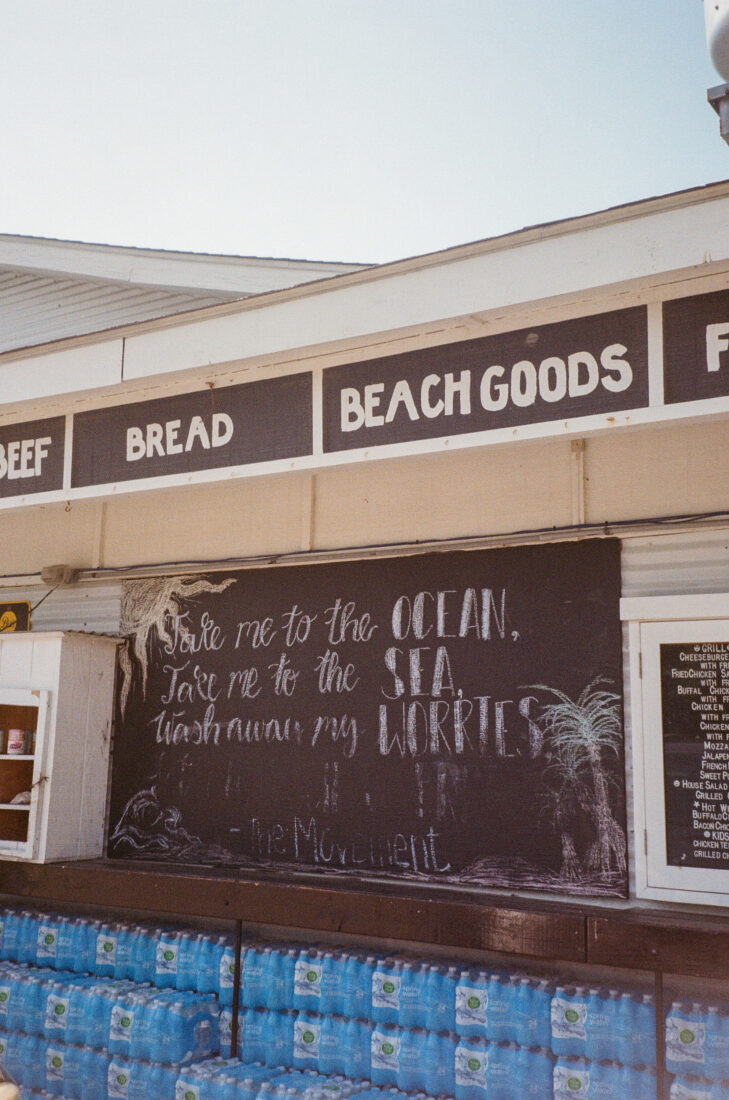 A chalkboard outside a market