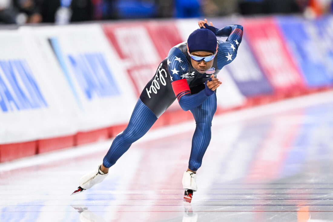 A woman speed skates on ice