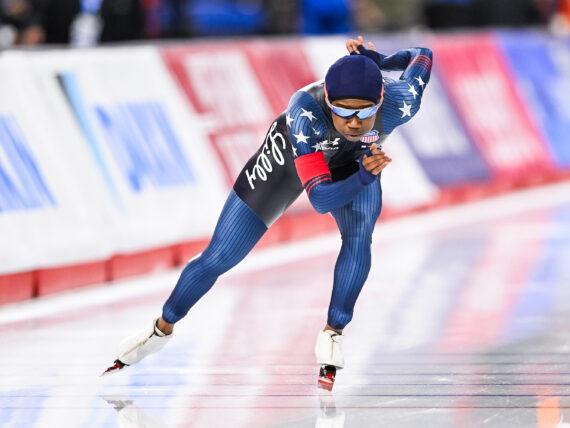 A woman speed skates on ice