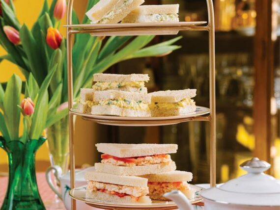 A tiered tray of sandwiches