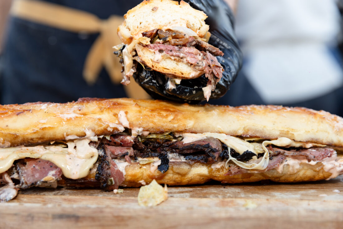 Live-fire pastrami Reubens by chef Siegel-Gardner.