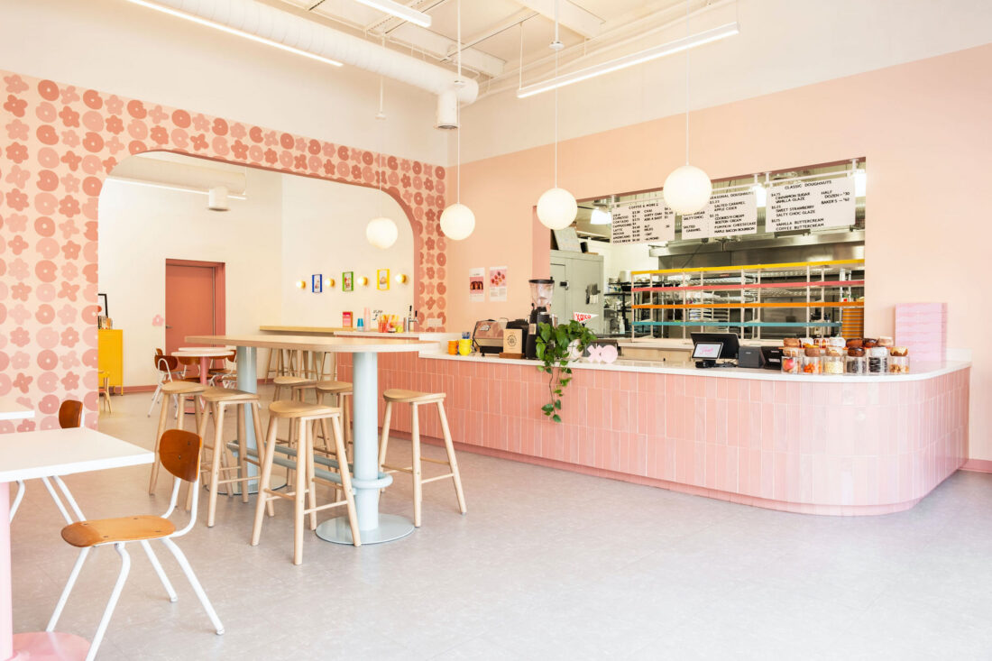 Inside a pink tiled cafe