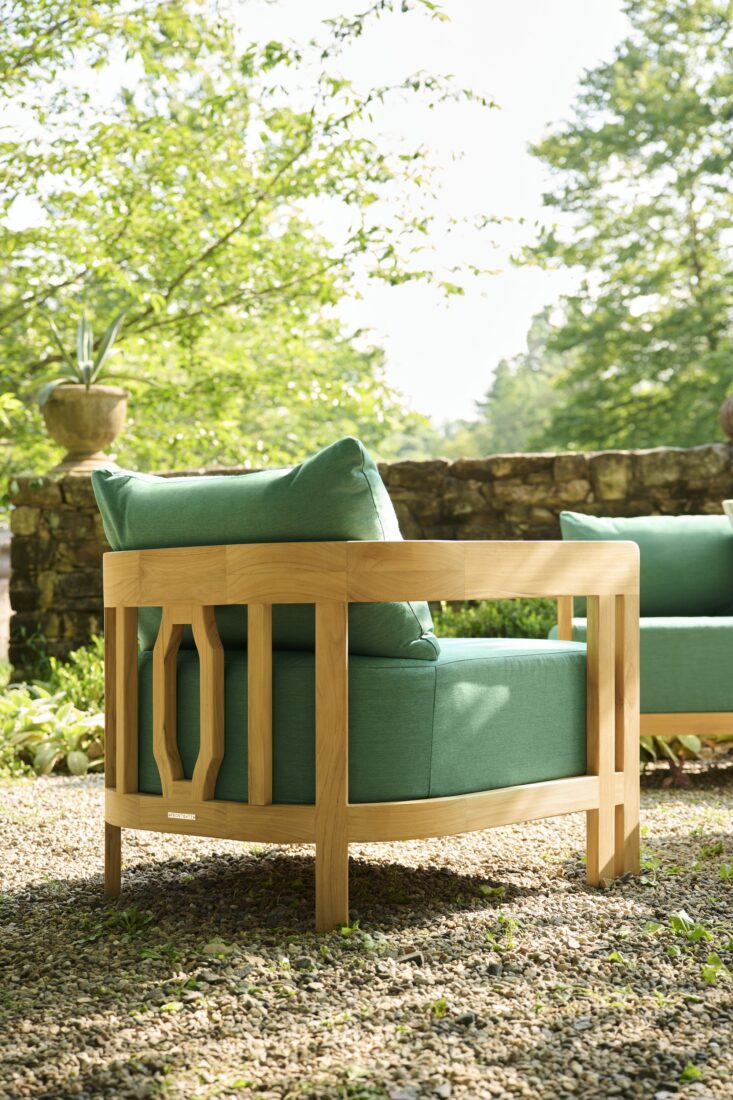 A dark teal outdoor chair