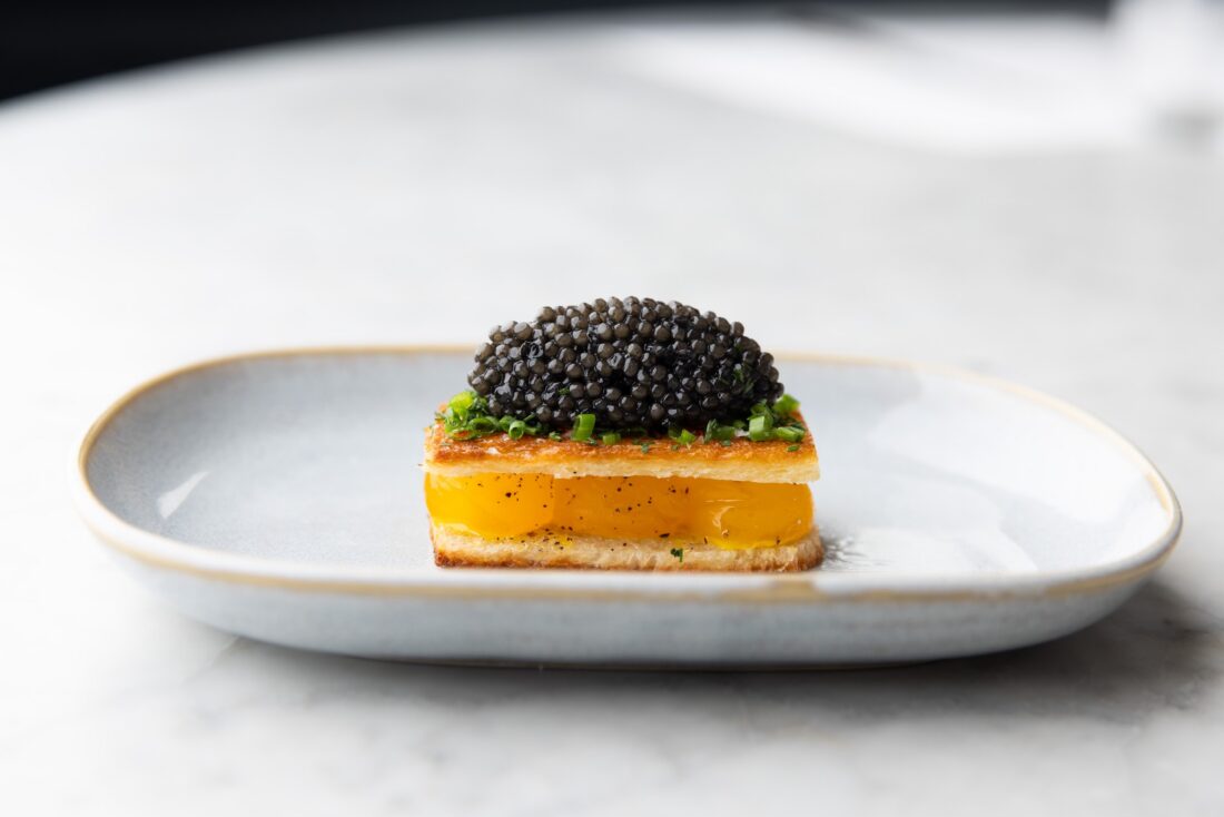 Caviar on egg toast