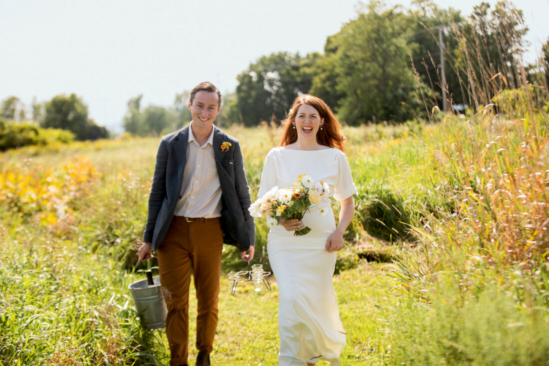 A married couple in a field