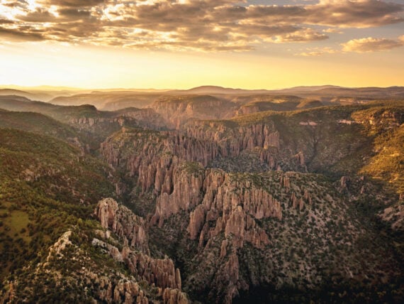 The sun sets over cliffs along the Gila River in southern New Mexico’s Gila Wilderness.