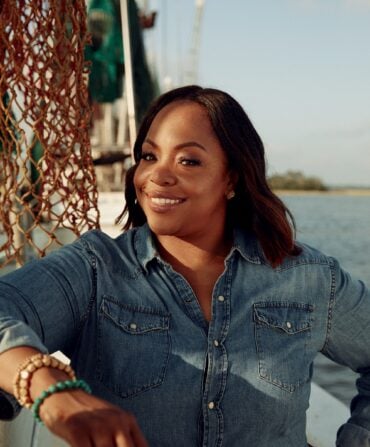 A portrait of a woman on a boat