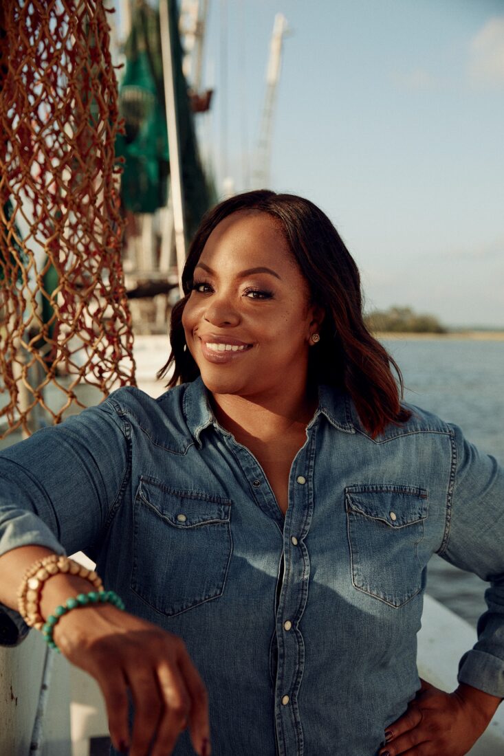 A portrait of a woman on a boat