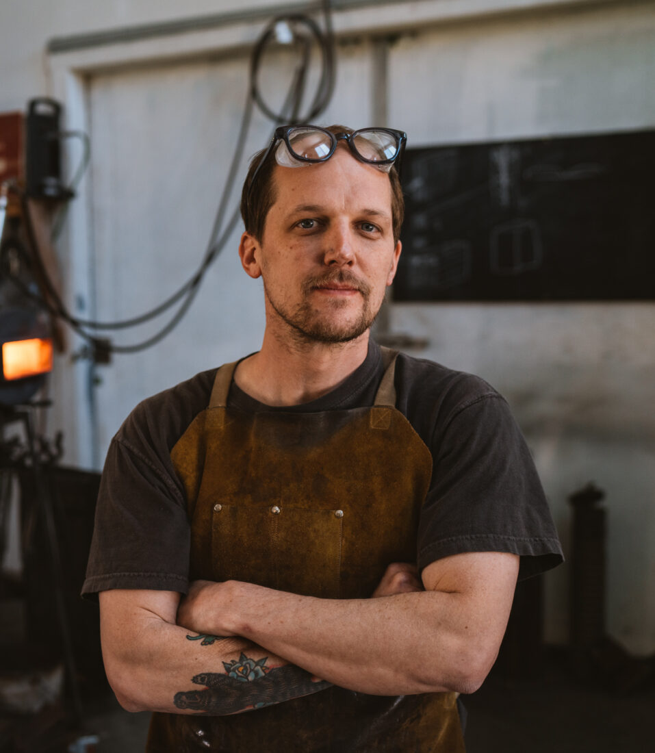 A man in a metal workshop