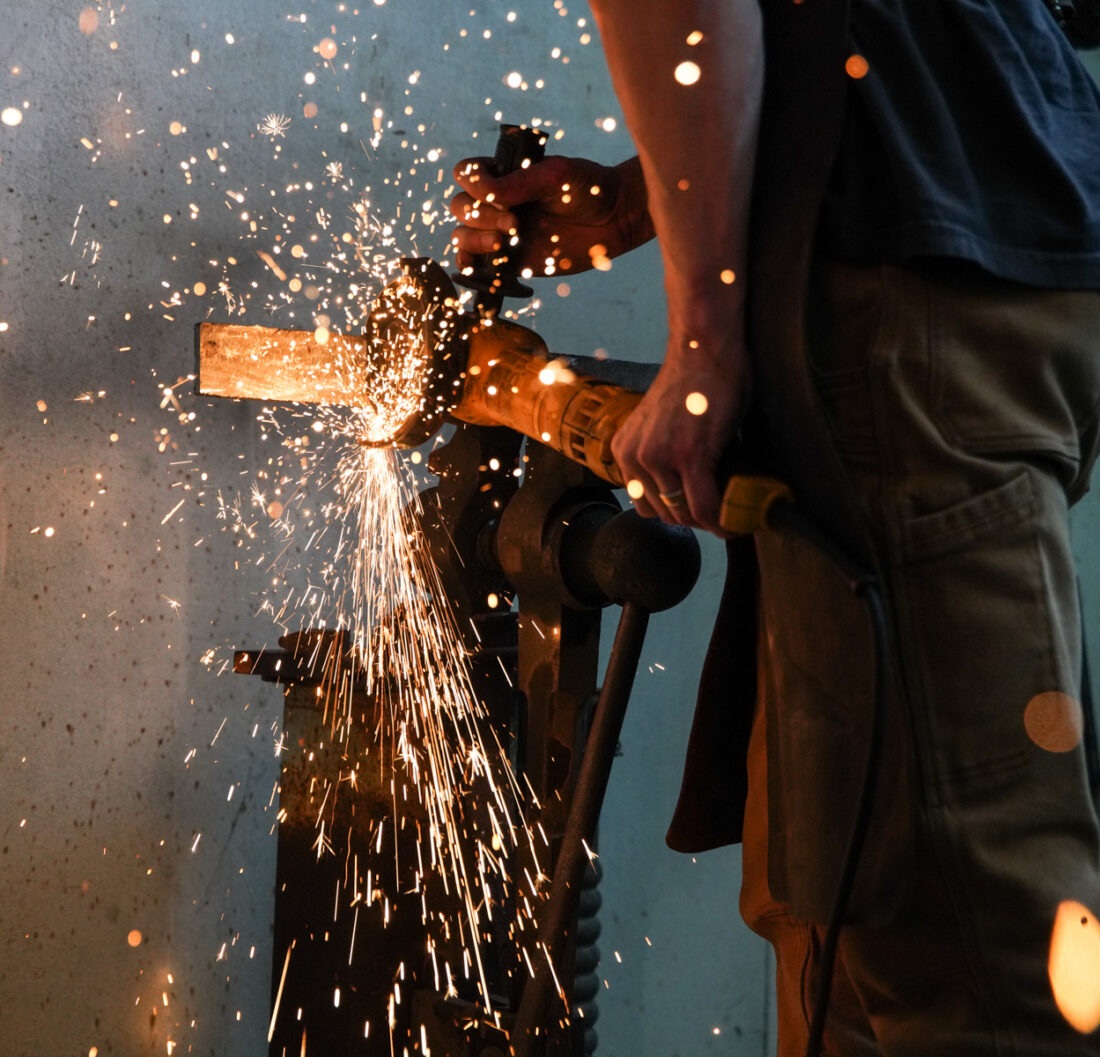 A man forges a knife