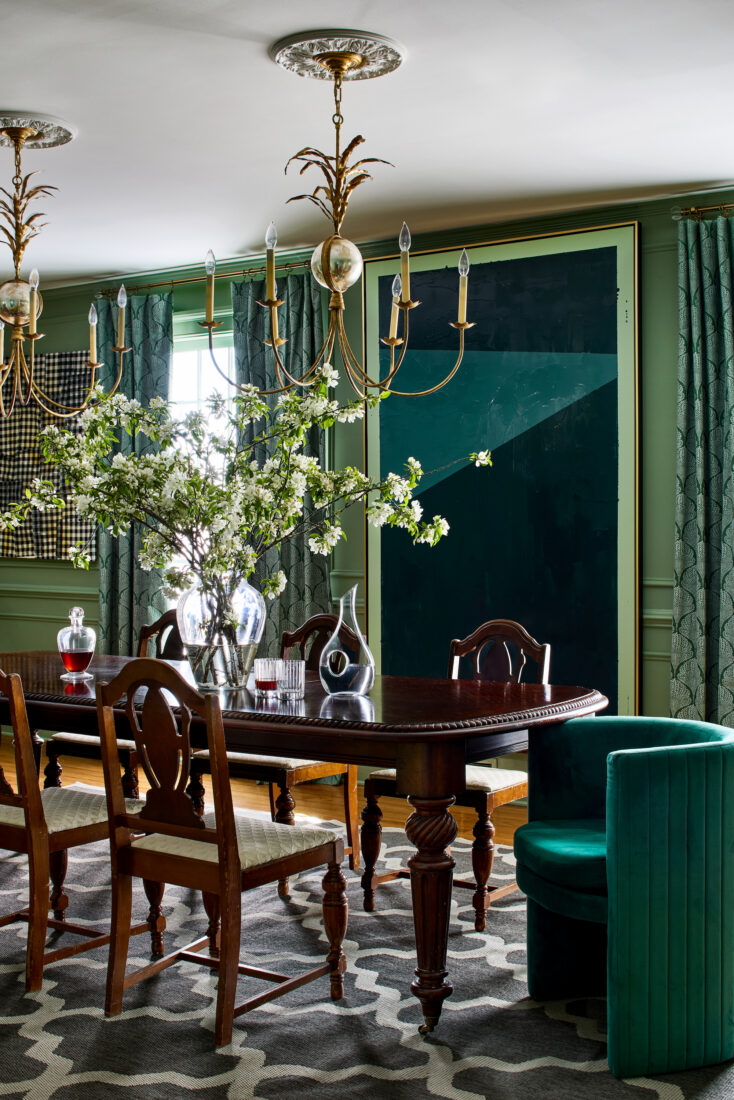 A dark green breakfast room