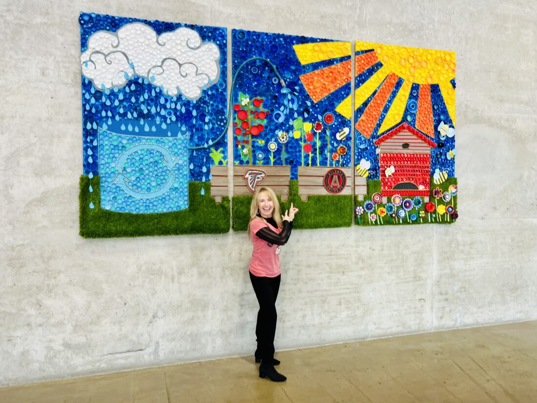 image of woman standing with three piece installation.