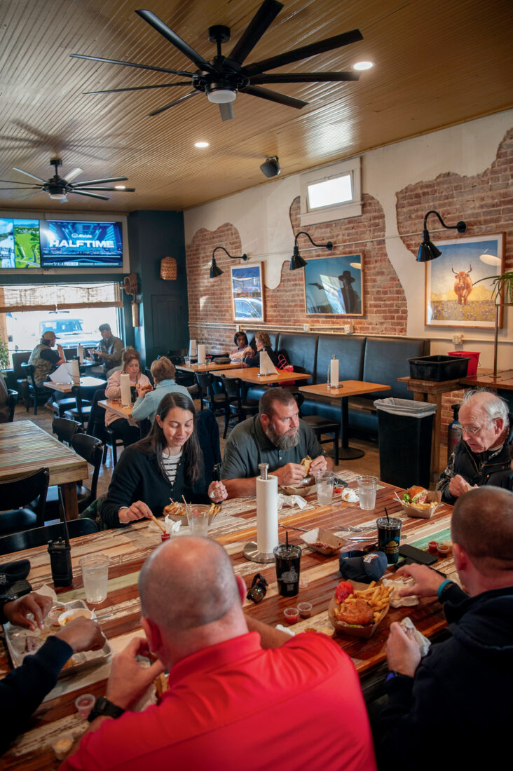 People eat inside a restaurant