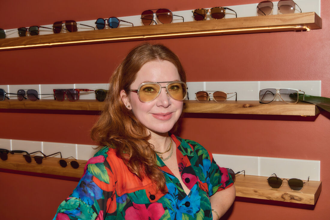 A woman in an eyeglass shop