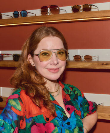 A woman in an eyeglass shop