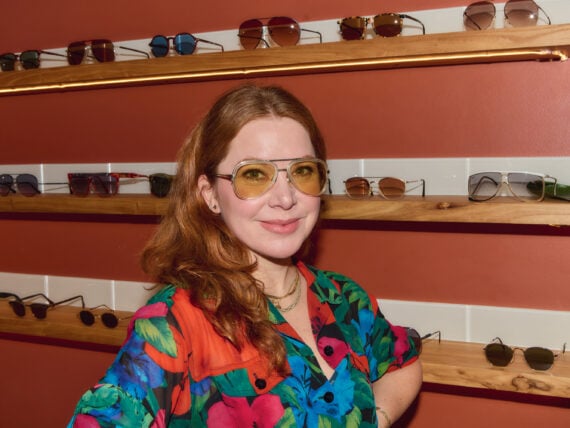 A woman in an eyeglass shop