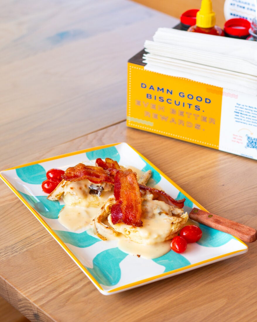 A biscuit with bacon and cheese
