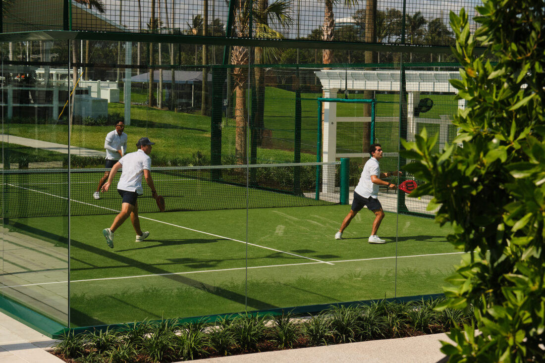 People on a pickleball court