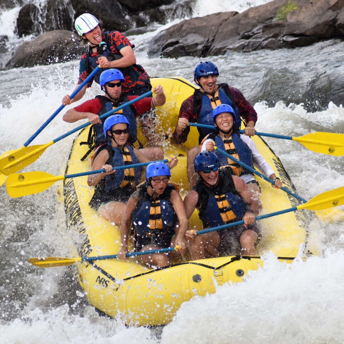 People on a raft in white water