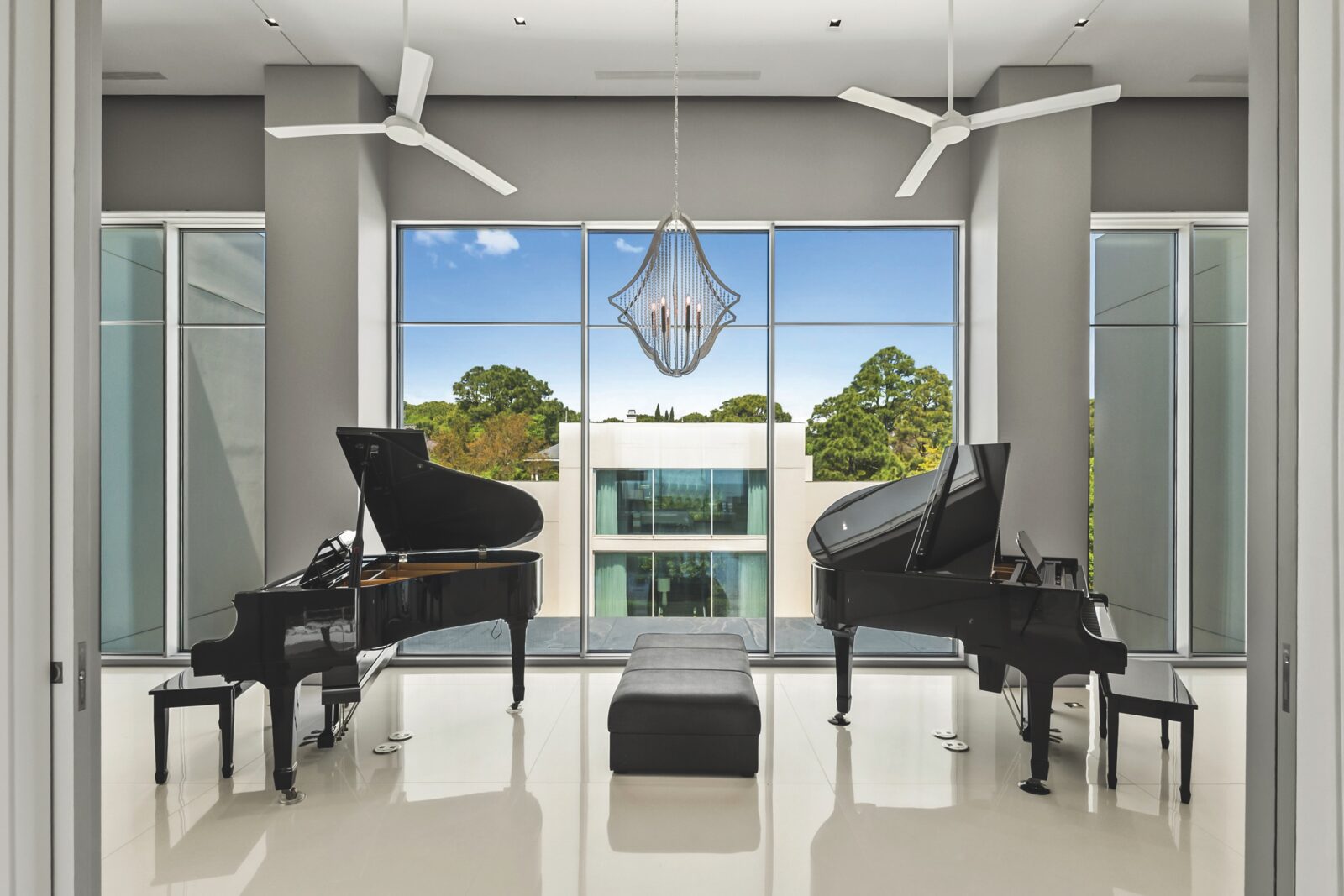 image of the second-floor gallery with two baby grand pianos