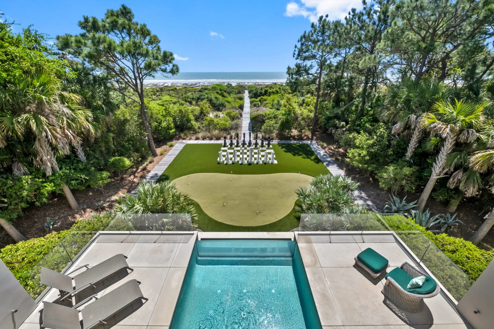 image of the life-size chess board and backyard of the home