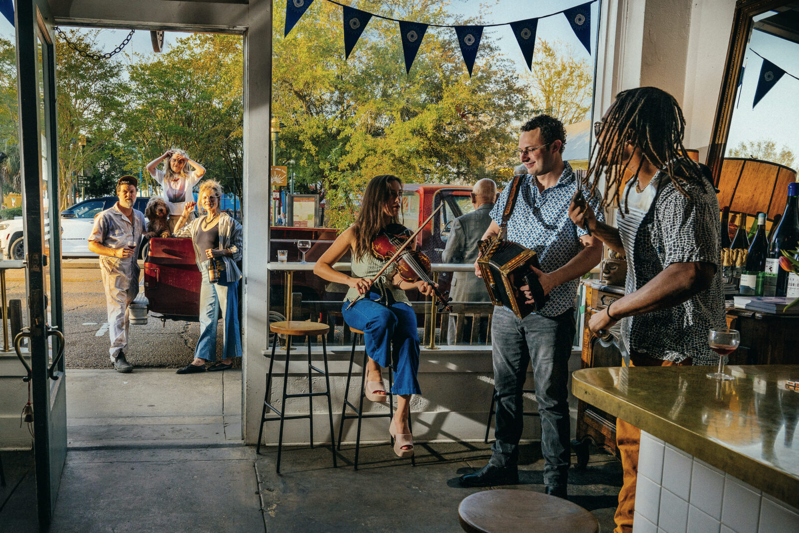 Musicians play on a patio