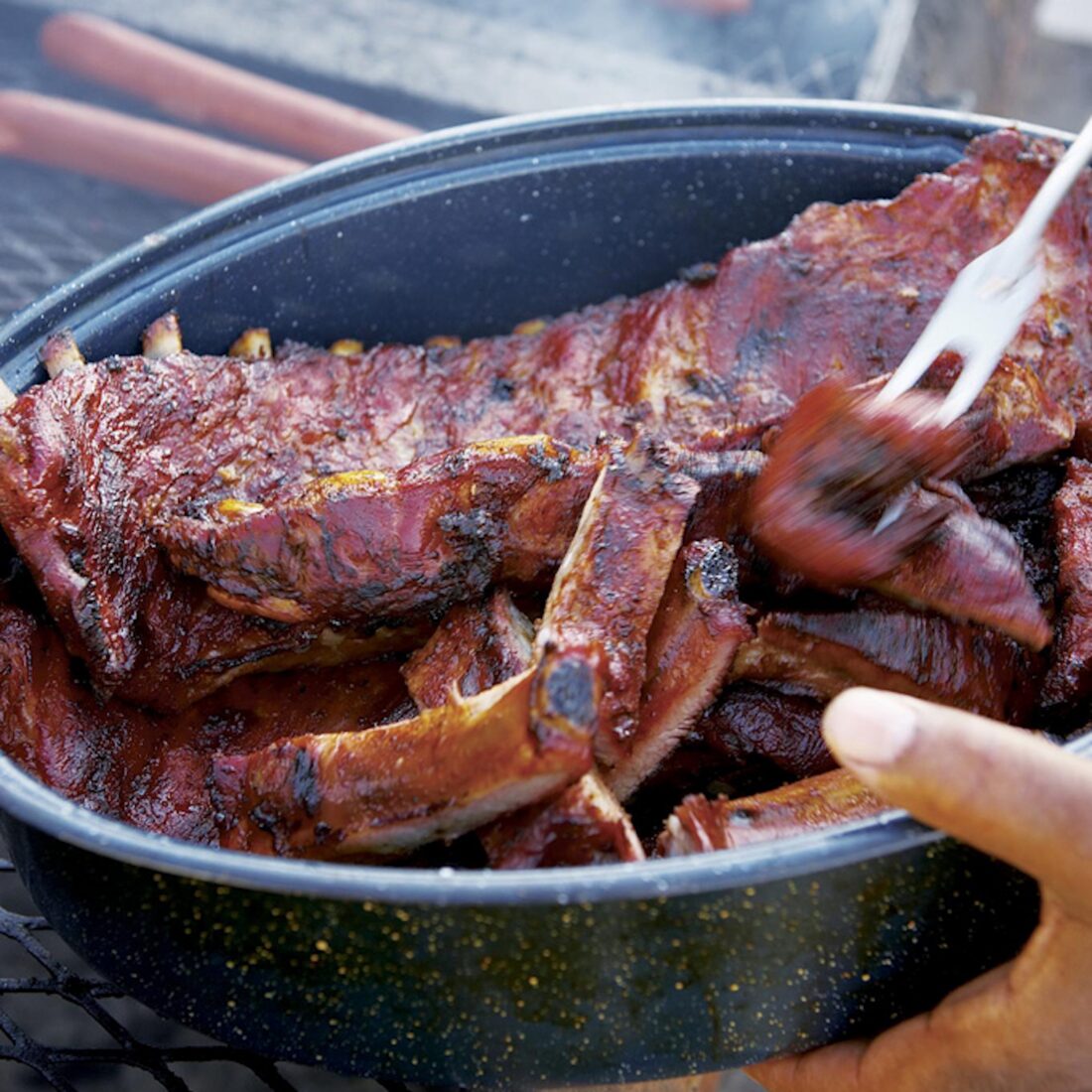 image of ribs cooking on a grill