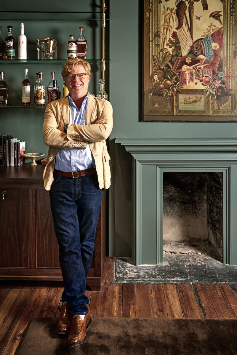 A portrait of a man in an office