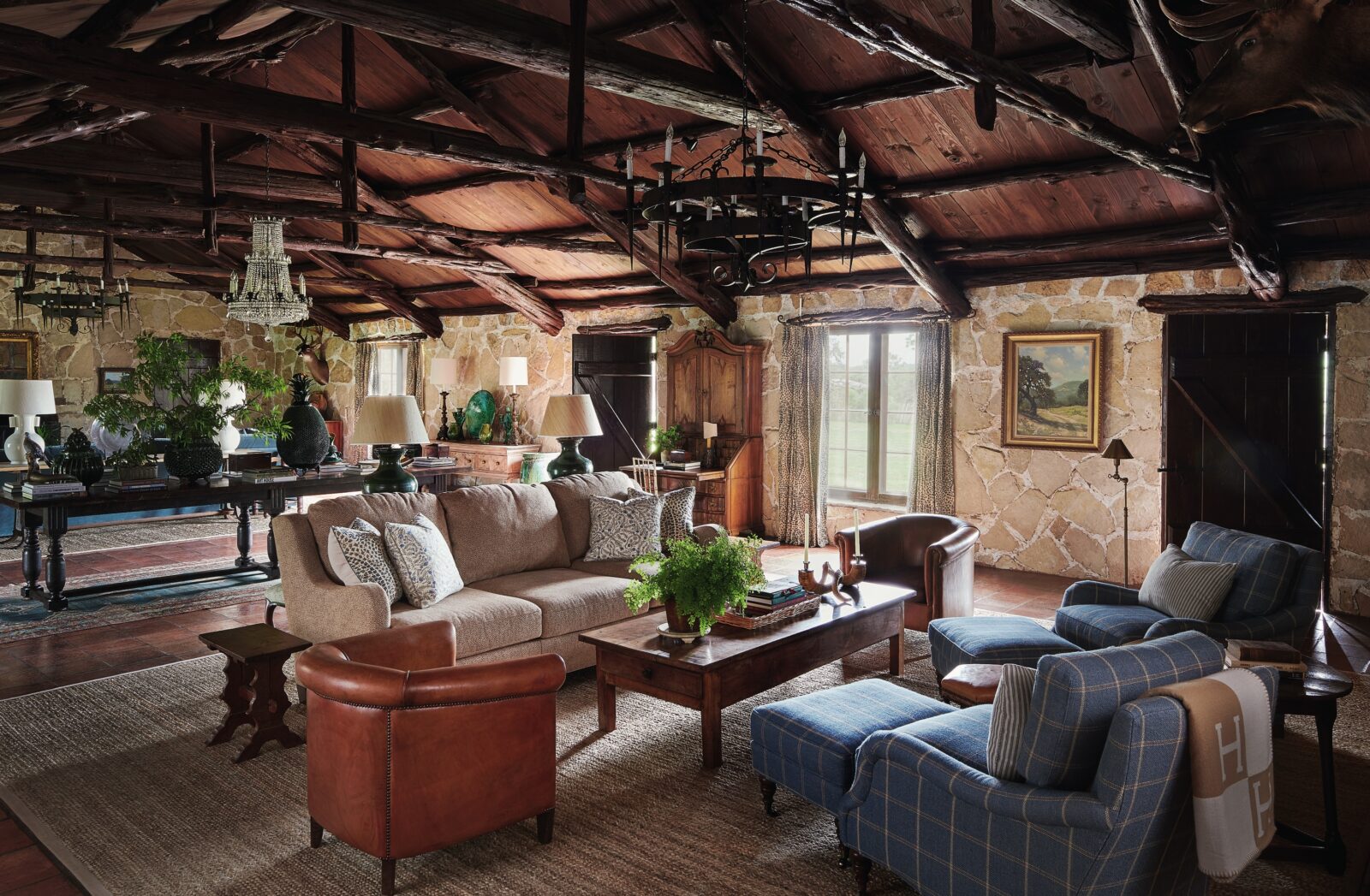 A living room with a wood ceiling