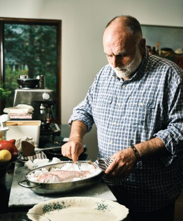 A man with a salt baked fish