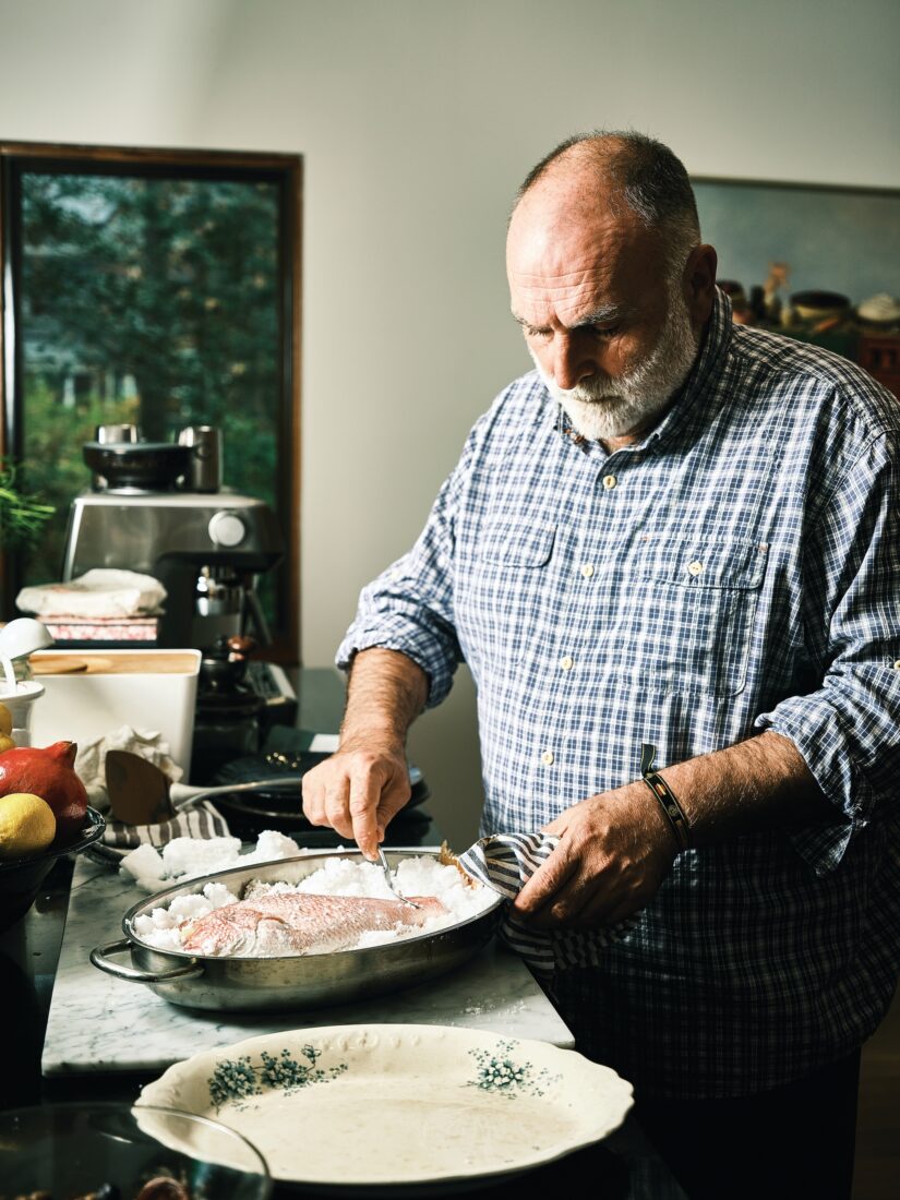 A man with a salt baked fish