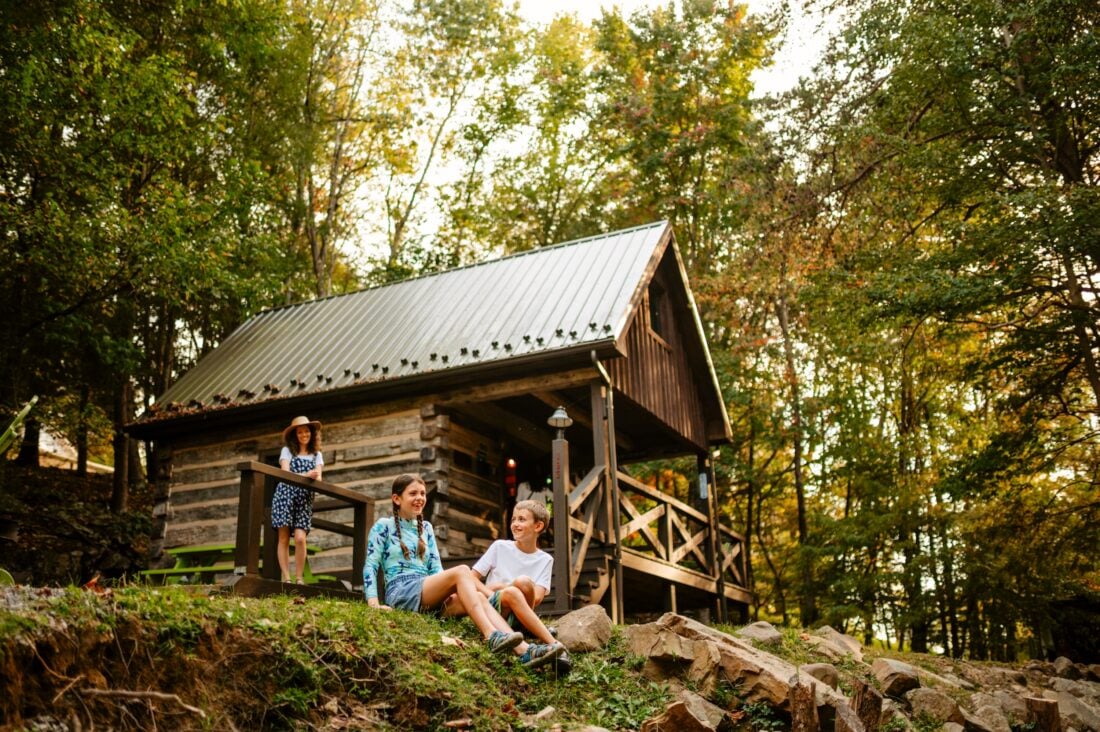 A family at a cabin