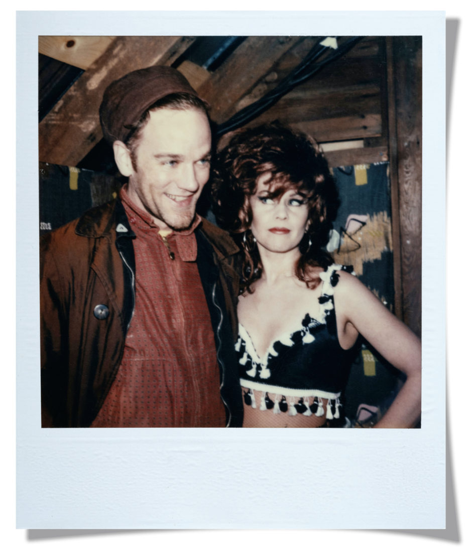 A polaroid of a man and woman
