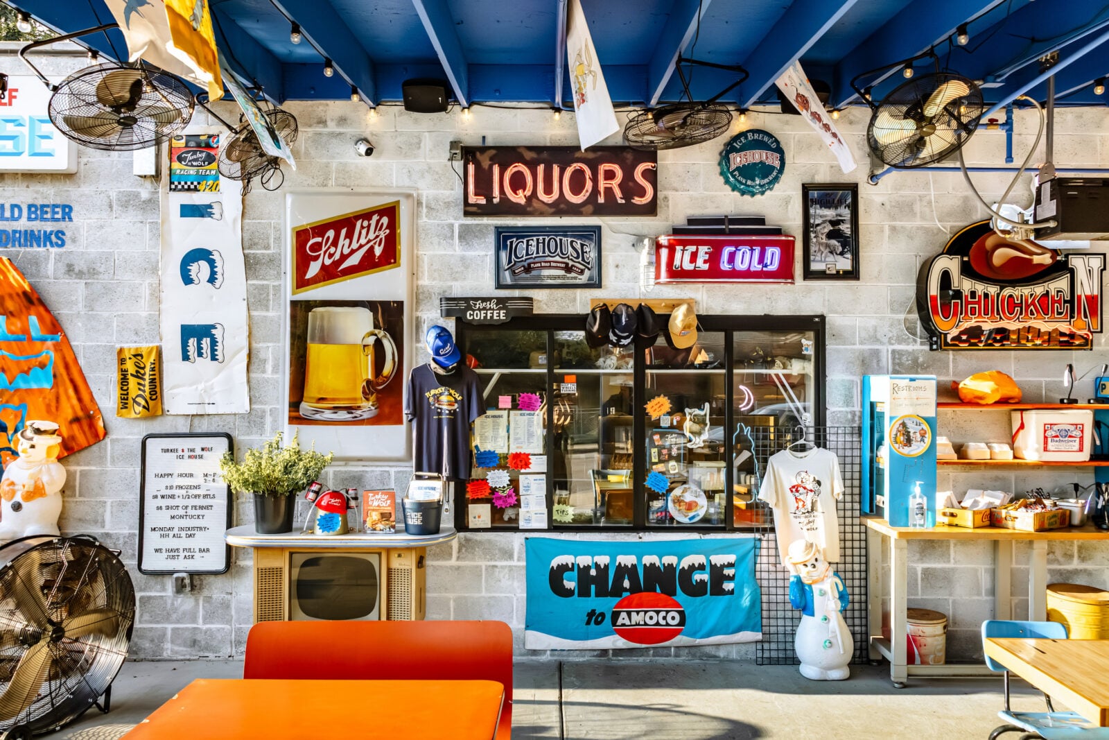 Outside a restaurant with lots of vintage signs and decor