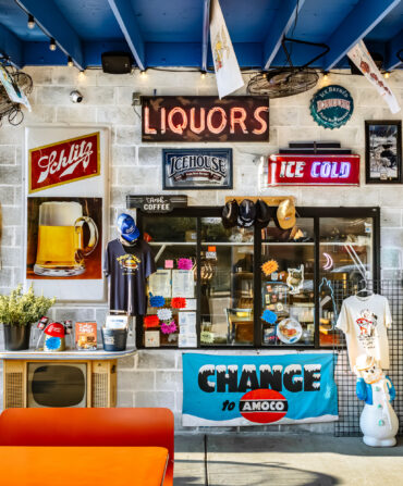 Outside a restaurant with lots of vintage signs and decor