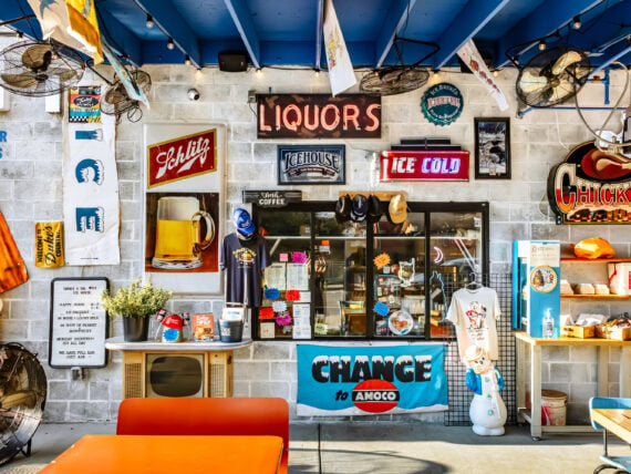 Outside a restaurant with lots of vintage signs and decor