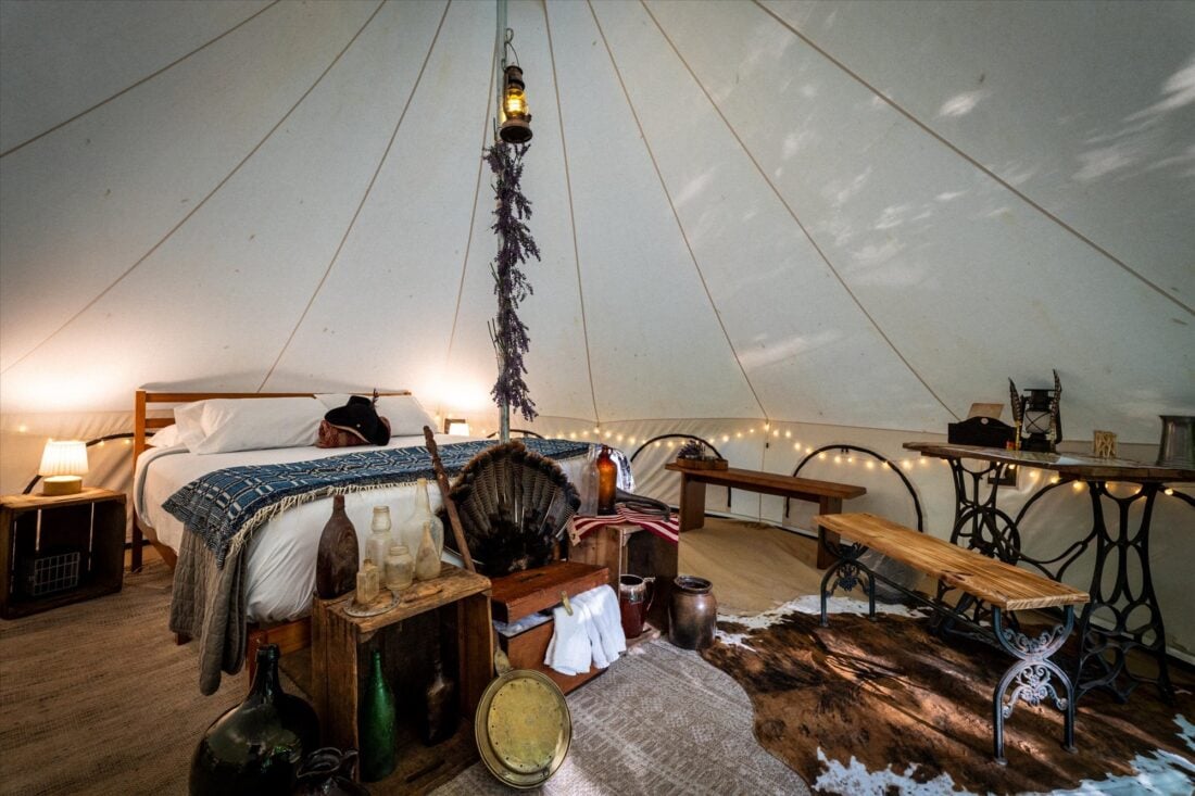 inside a glamping tent designed to resemble 1776