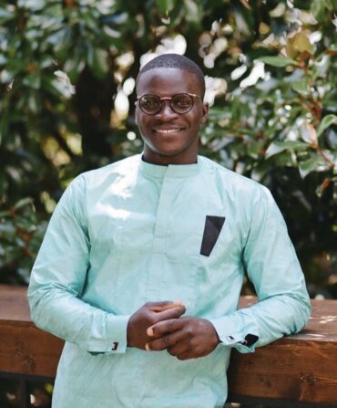 A chef in a blue coat