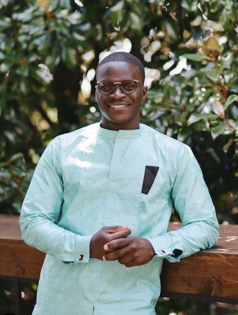 A chef in a blue coat