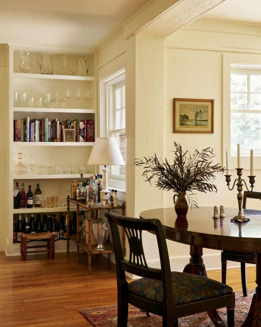 image of a living room , bar cart and bookshelf