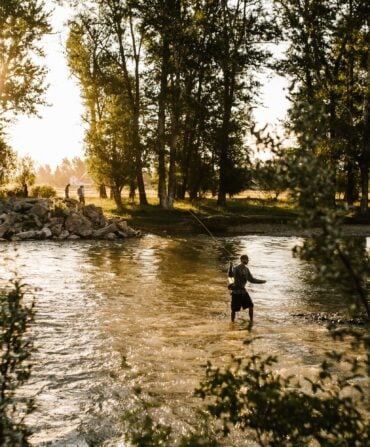 A man fly fishes