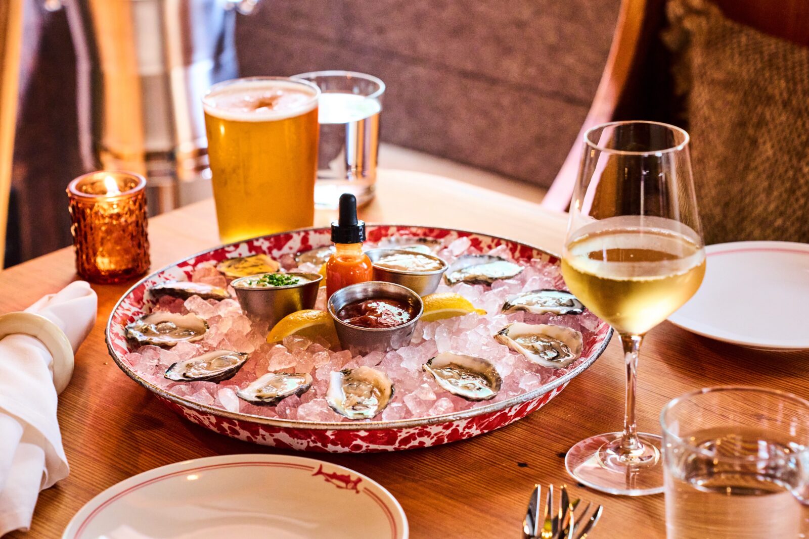 image of a dozen oysters over ice on a half shell