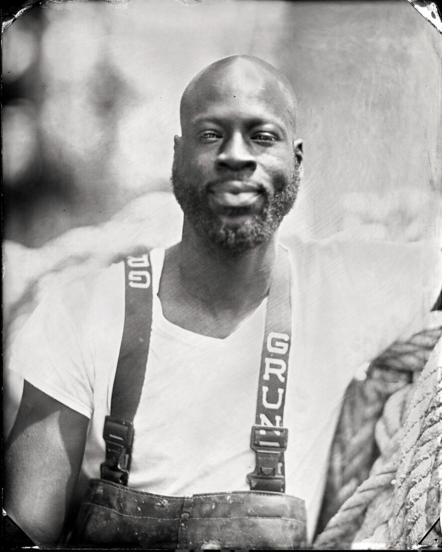 A portrait of a man with waders