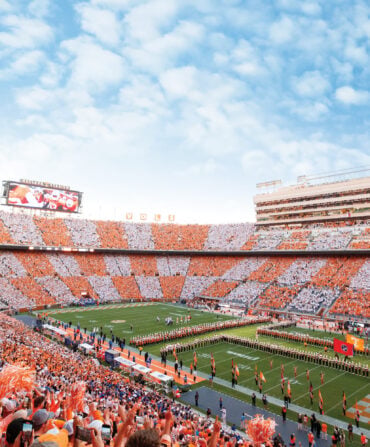 The Tennessee Volunteers run through the ”T“ during a 2024 game at the University of Tennessee’s Neyland Stadium.